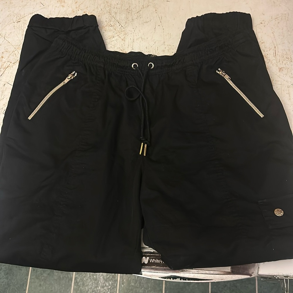 Jaanuu scrub bottoms with gold zippers